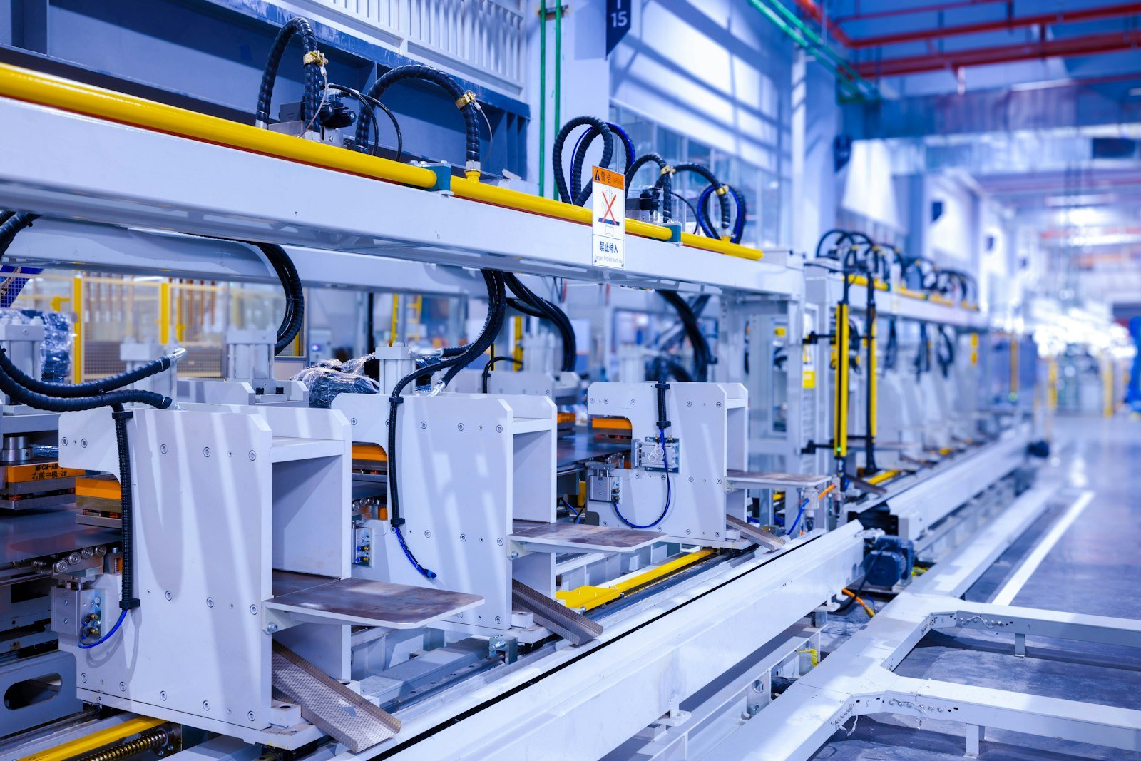 An automated hardware production line inside a modern factory