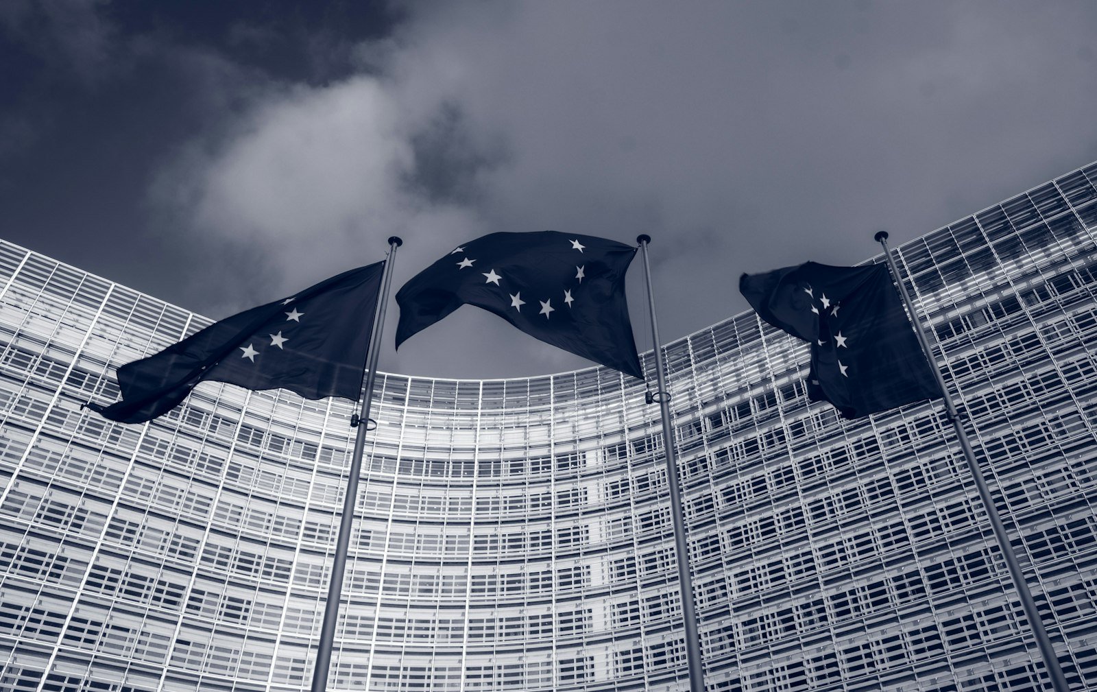 European Union flags outside the Berlaymont, the European Commission headquarters in Brussels